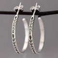 Boucles d'Oreilles Créoles Argentées Élégantes