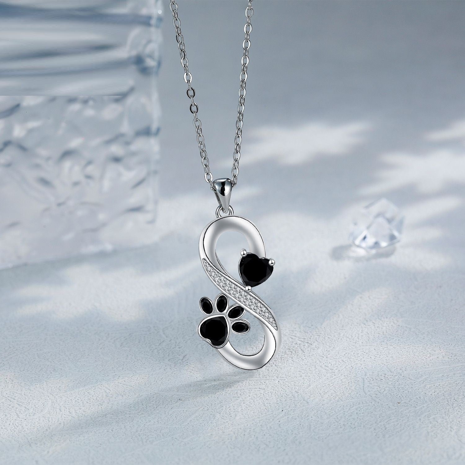 Collier d'empreinte de patte de cœur infini