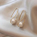 Boucles d'Oreilles Pendantes en Perles Élégantes