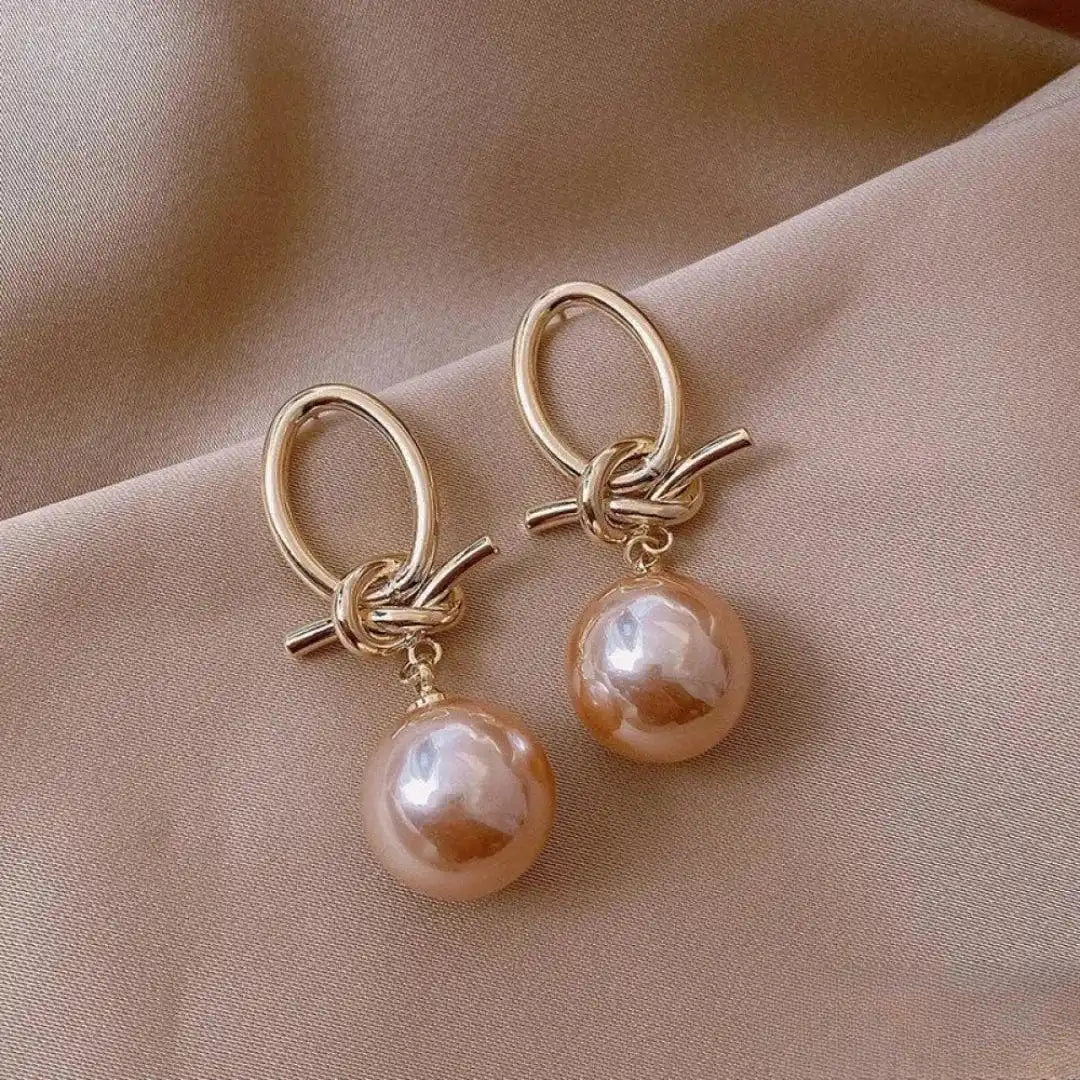 Boucles d'Oreilles en Perles Roses Élégantes