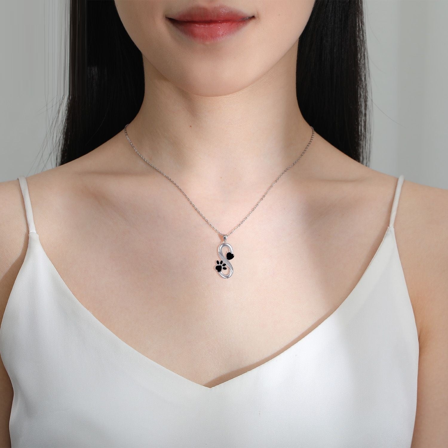 Collier d'empreinte de patte de cœur infini