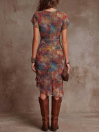 Martina | Robe midi plissée avec décolleté en V, impression d'art abstrait de style bohémien