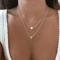 Collier élégant avec cœur et perles