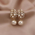 Boucles d'Oreilles en Perles avec Design de Fleur Élégante