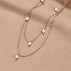Collier Multicouche avec Gouttes de Perles