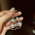 Boucles d'Oreilles avec Perles Cultivées et Sphères Embellies